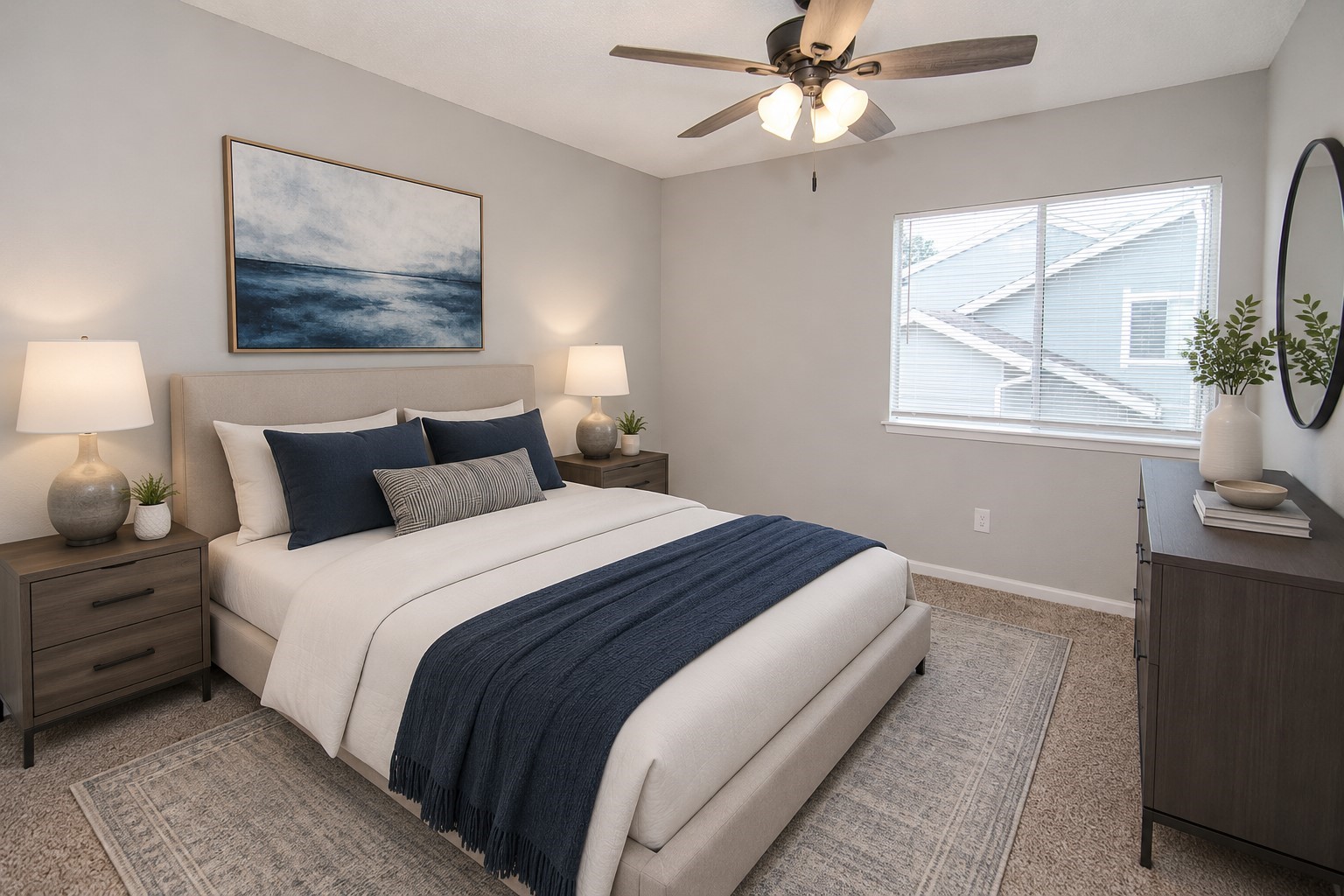 13009 Wirevine Lane Houston, TX 77072 - Photo 15 of 18 Guest Bedroom with neutral gray walls and plush carpet. It features a ceiling fan with lights and a window with blinds, allowing natural light to fill the space.