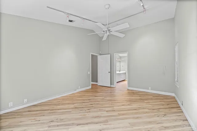 a view of a room with racks on the wall