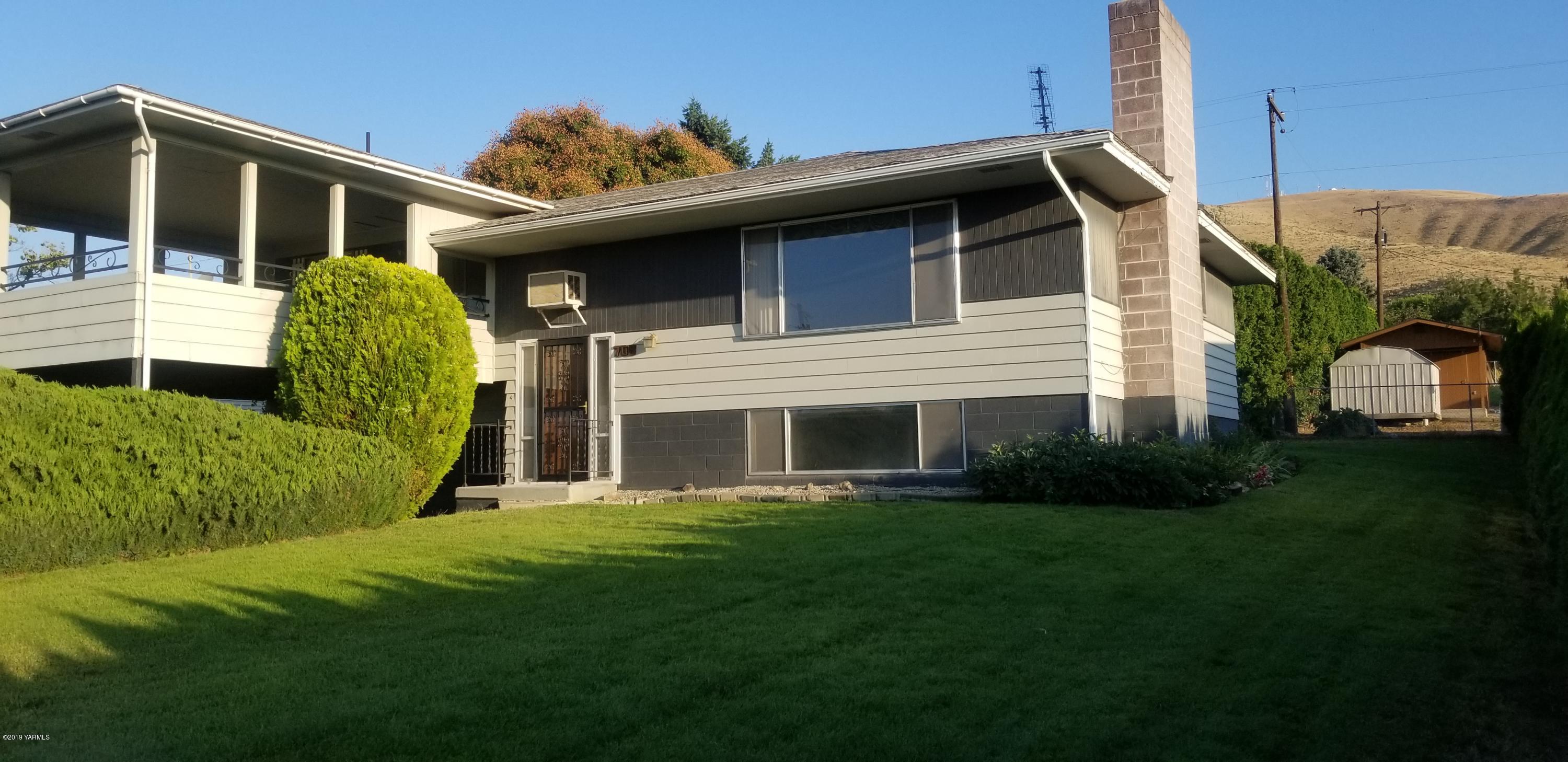 708 Meadowbrook Road Yakima, WA 98903 - Photo 12 of 65 a view of a house with a yard