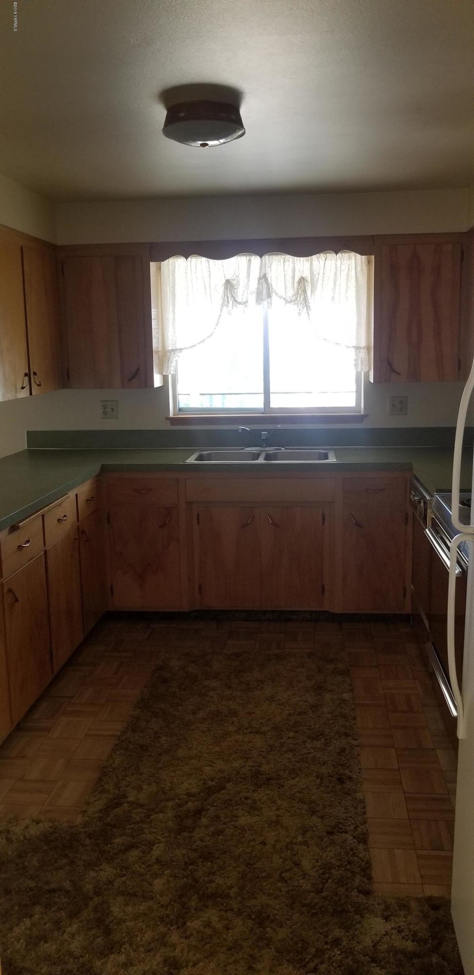 708 Meadowbrook Road Yakima, WA 98903 - Photo 35 of 65 a view of an empty room with a window