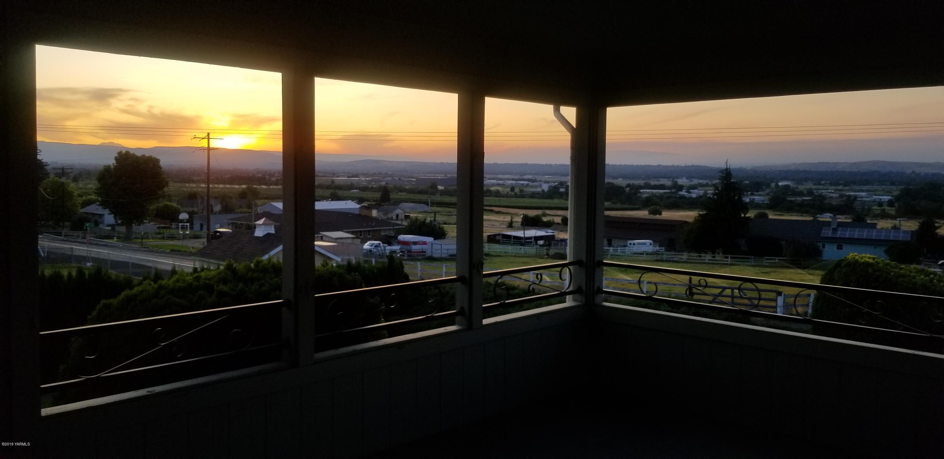 708 Meadowbrook Road Yakima, WA 98903 - Photo 57 of 65 a view of a glass door with a balcony from a room