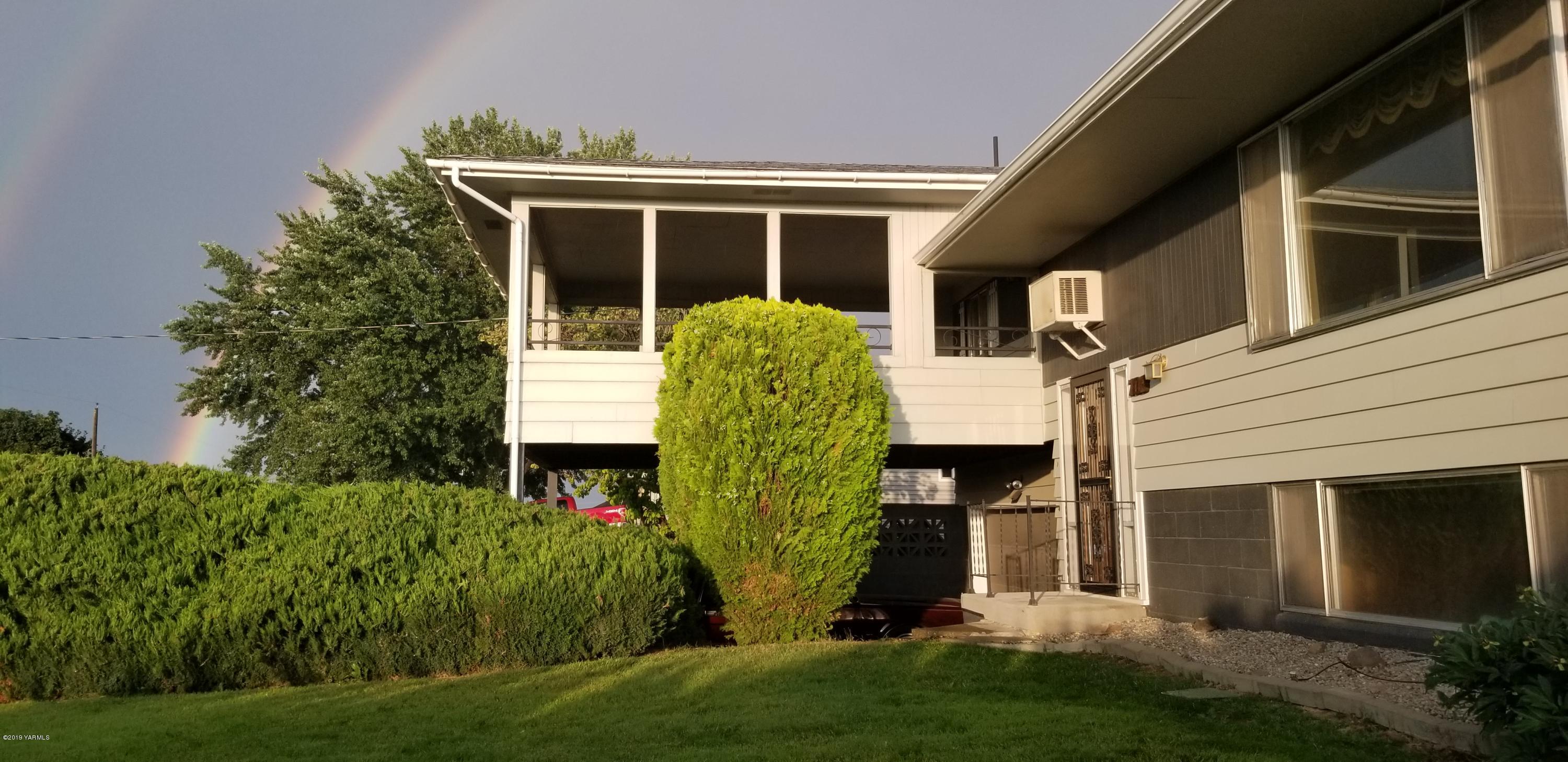 708 Meadowbrook Road Yakima, WA 98903 - Photo 10 of 65 a view of a house with backyard and garden