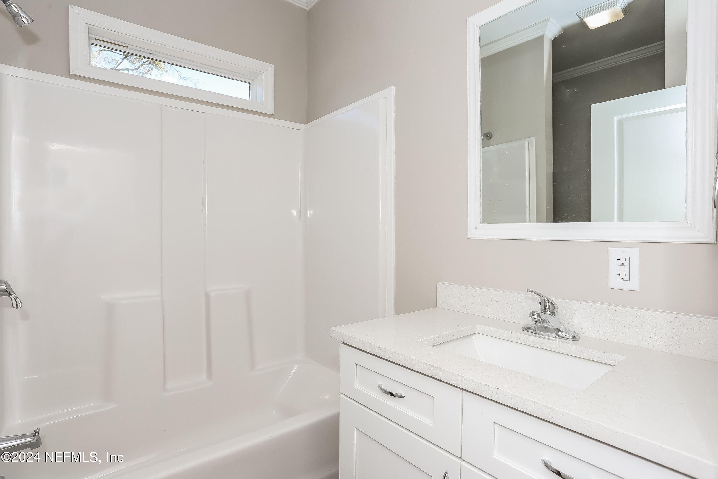 2119 Lewis Street Jacksonville, FL 32204 - Photo 12 of 14 a bathroom with a sink and a bathtub