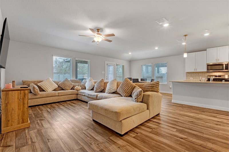 2643 Homestead Rnch Lane Crosby, TX 77532 - Photo 19 of 23 a living room with furniture and wooden floor