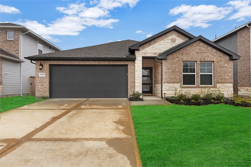 2643 Homestead Rnch Lane Crosby, TX 77532 - Photo 8 of 23 a front view of a house with a yard