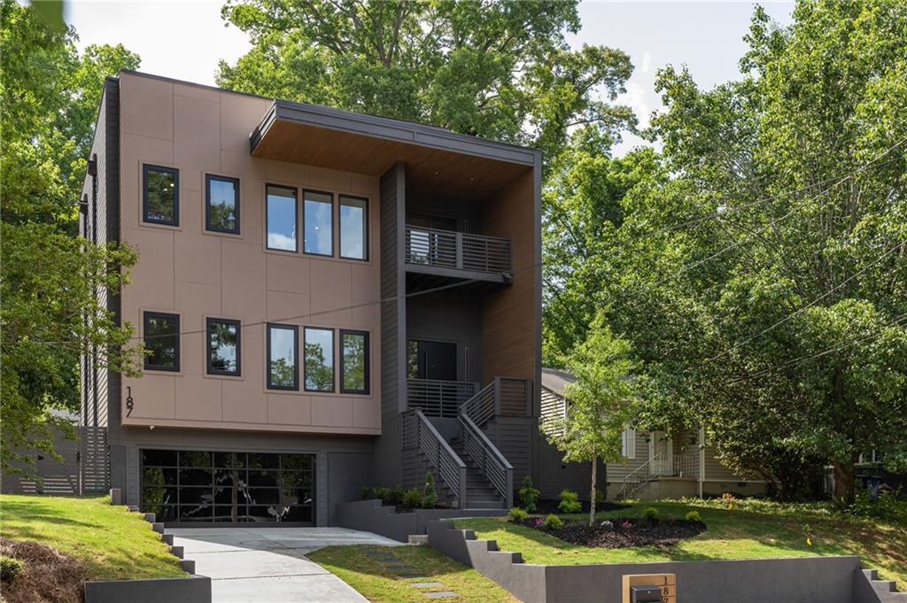 187 Clay Street Southeast Atlanta, GA 30317 - Photo 1 of 1 a front view of a house with garden