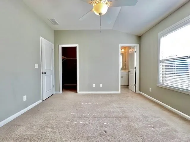 an empty room with windows