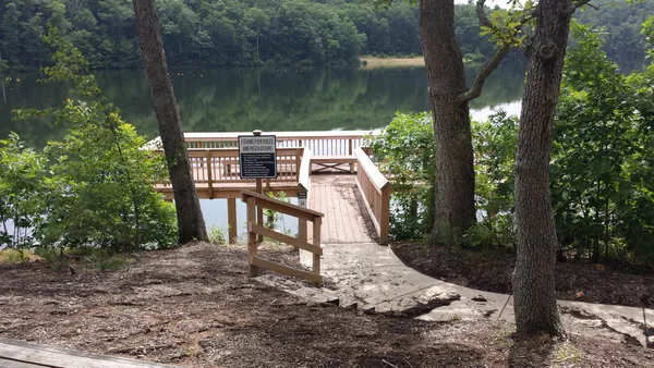 a view of a lake in middle of the house