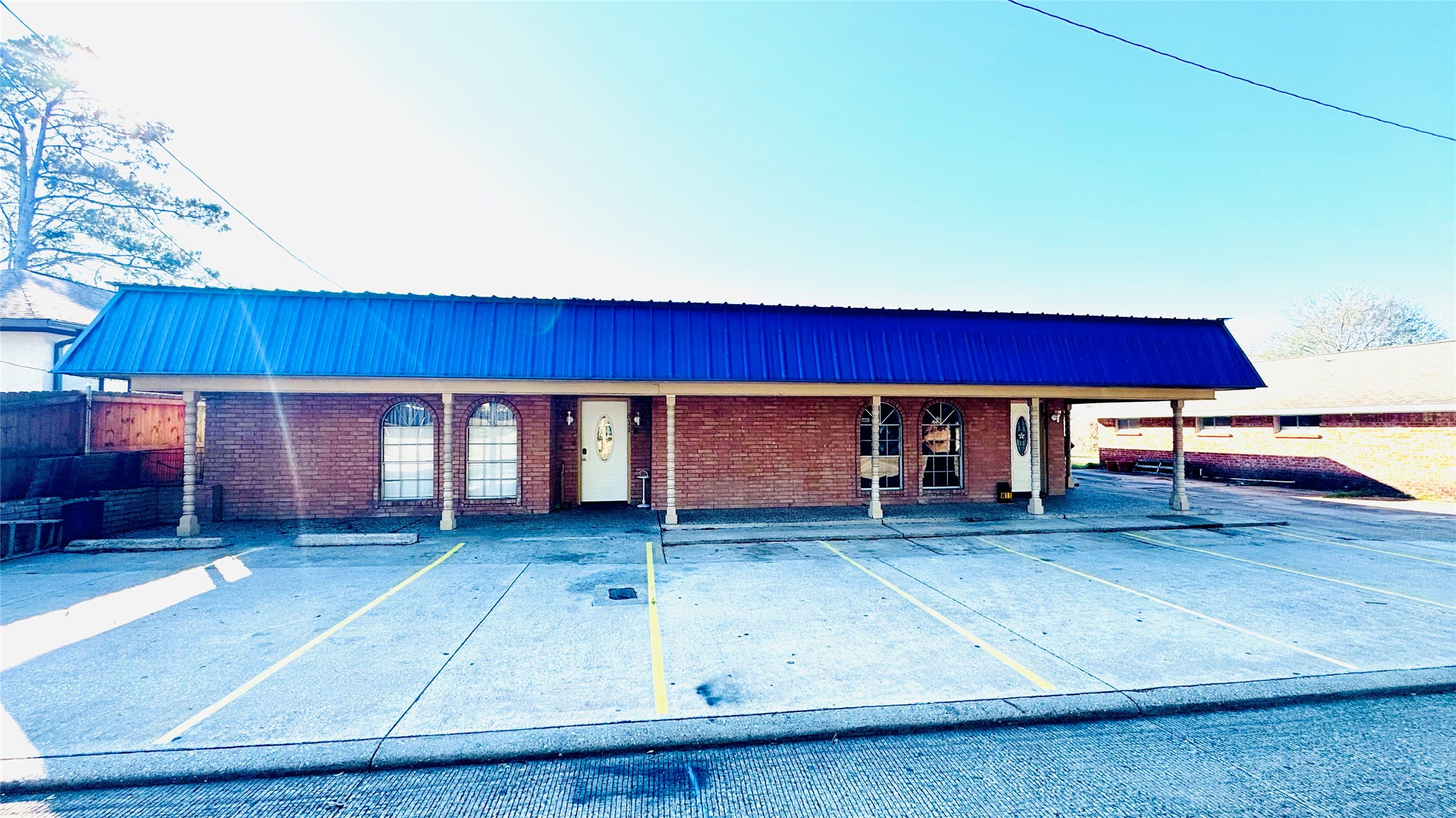 811 North Travis Street Liberty, TX 77575 - Photo 1 of 31 a view of a house with a yard