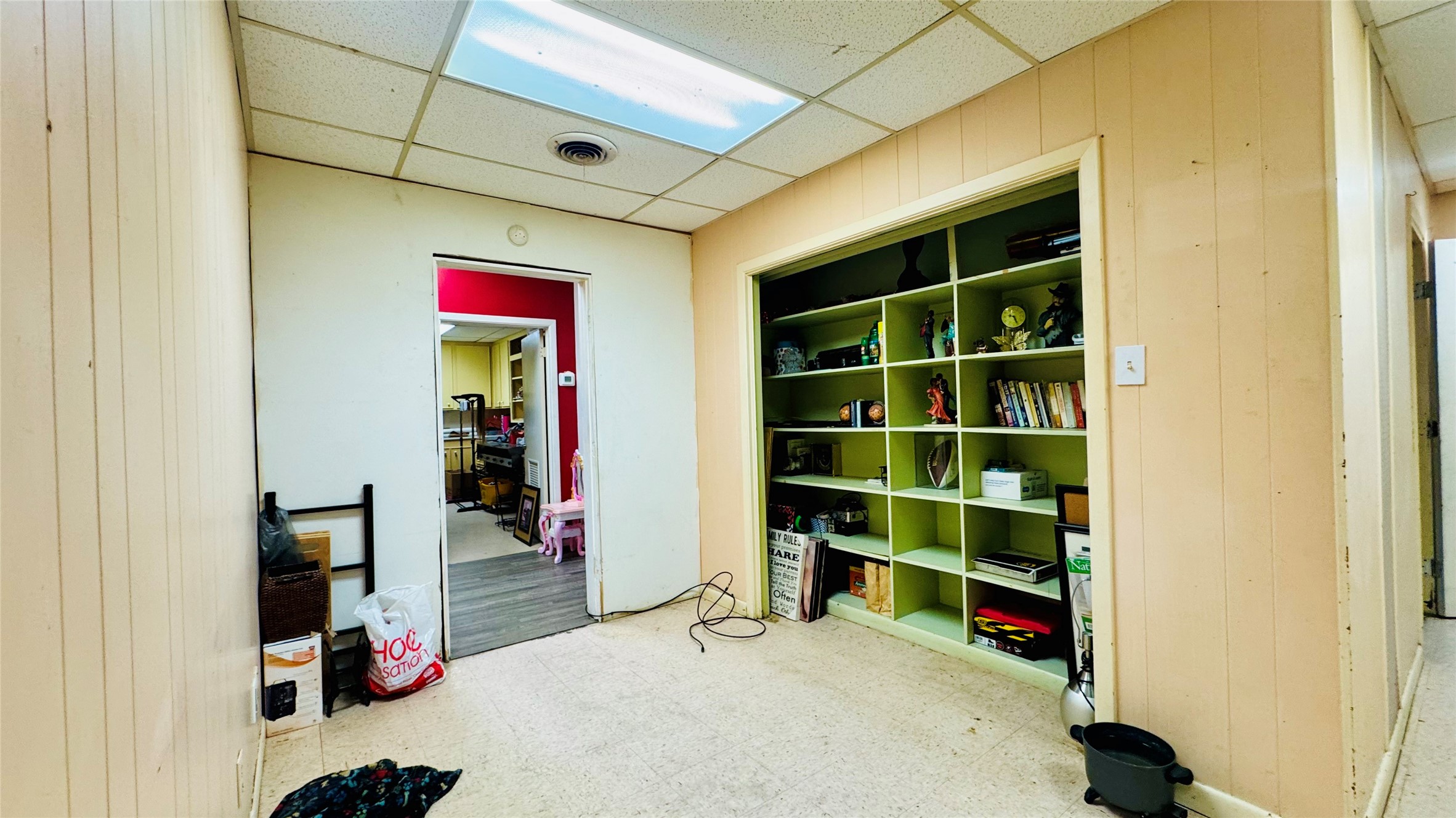 811 North Travis Street Liberty, TX 77575 - Photo 11 of 31 a view of room with shelves