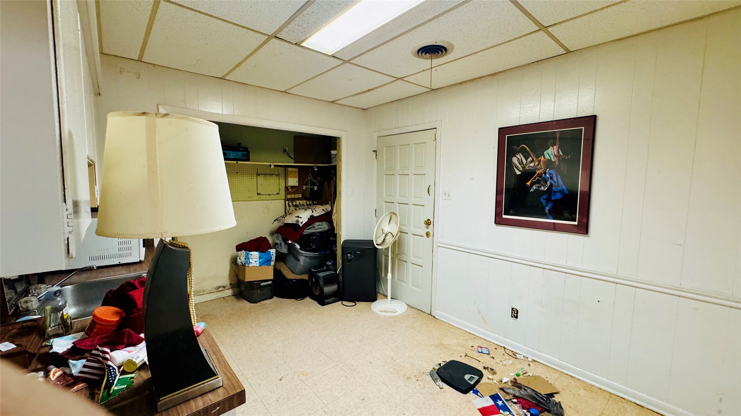 811 North Travis Street Liberty, TX 77575 - Photo 17 of 31 a room with storage and utility