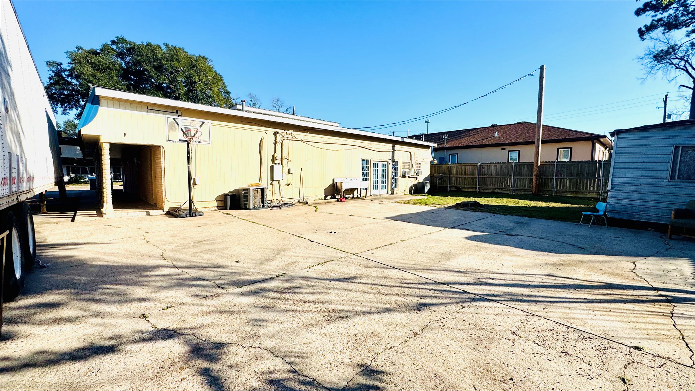811 North Travis Street Liberty, TX 77575 - Photo 20 of 31 a view of a parking space in front of a house
