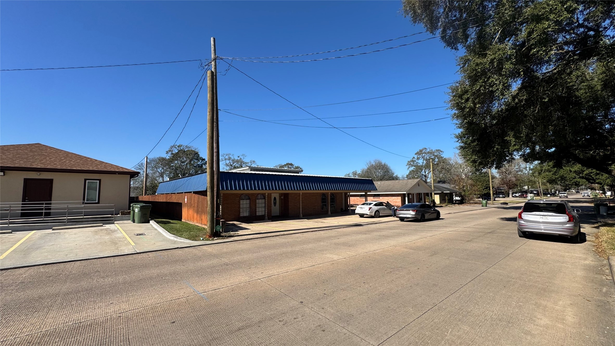 811 North Travis Street Liberty, TX 77575 - Photo 26 of 31 a view of a street with cars on road