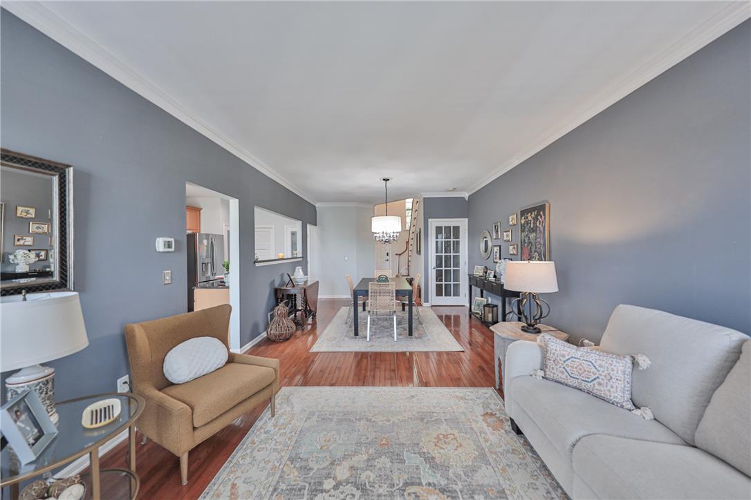 163 Muirfield Way Easton, PA 18042 - Photo 9 of 48 a living room with furniture and wooden floor