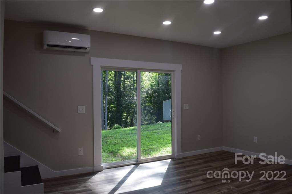 162 Gold Run Rutherfordton, NC 28139 - Photo 17 of 26 a view of a room with wooden floor and windows