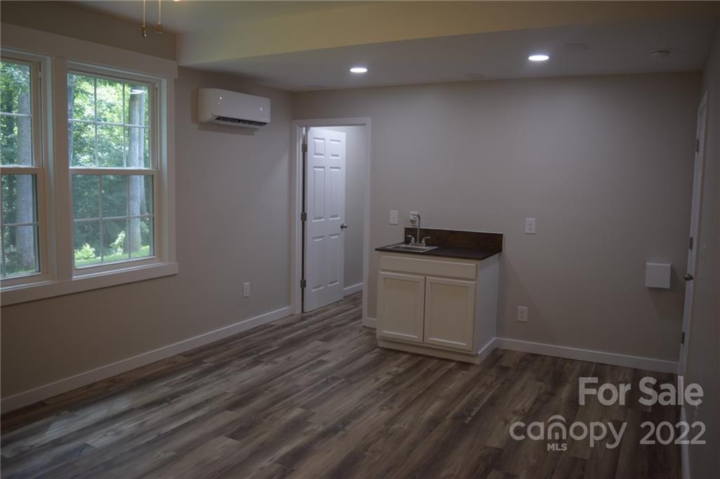 162 Gold Run Rutherfordton, NC 28139 - Photo 22 of 26 a view of a room with wooden floor and window