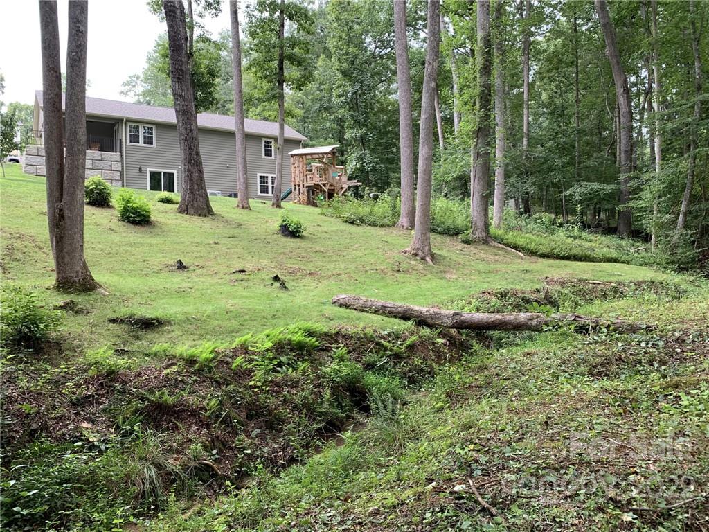 162 Gold Run Rutherfordton, NC 28139 - Photo 26 of 26 a view of a garden with large trees