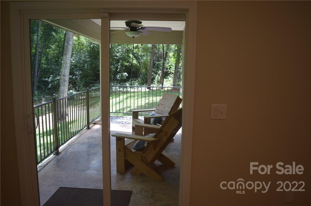 162 Gold Run Rutherfordton, NC 28139 - Photo 6 of 26 a view of a porch with a floor to ceiling window