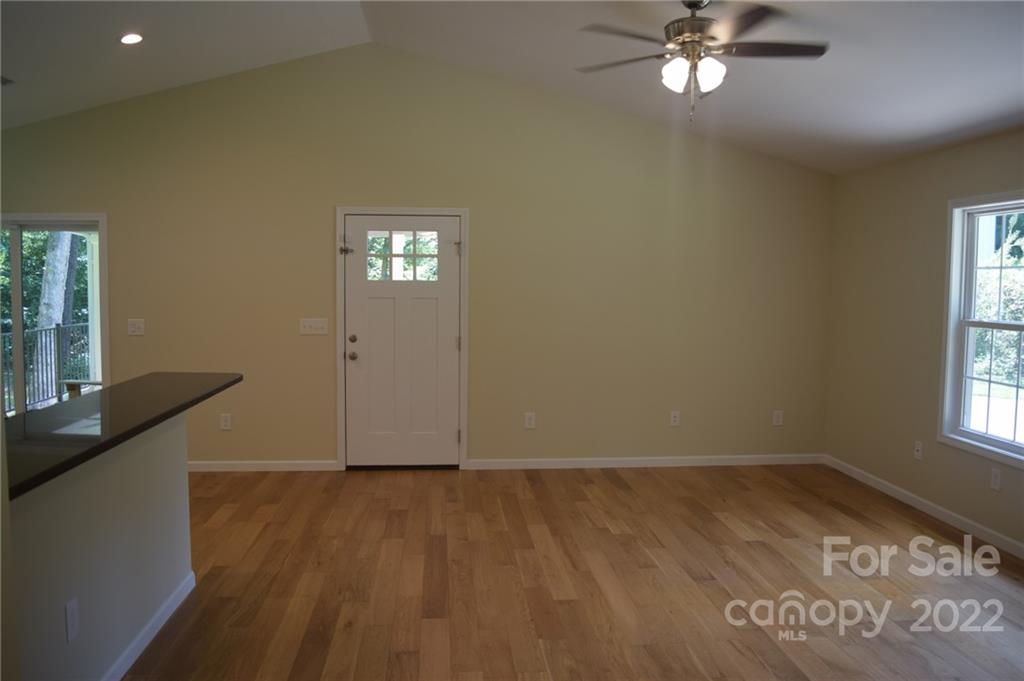 162 Gold Run Rutherfordton, NC 28139 - Photo 8 of 26 wooden floor in an empty room with a window