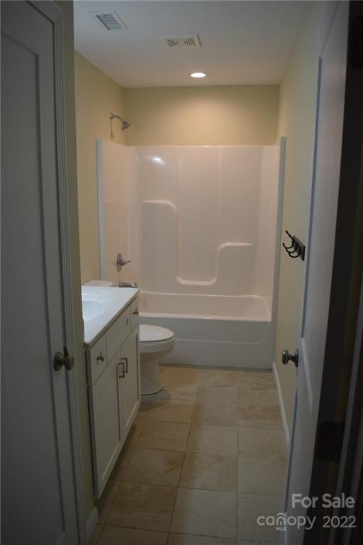 162 Gold Run Rutherfordton, NC 28139 - Photo 9 of 26 a bathroom with a bathtub sink vanity granite and toilet