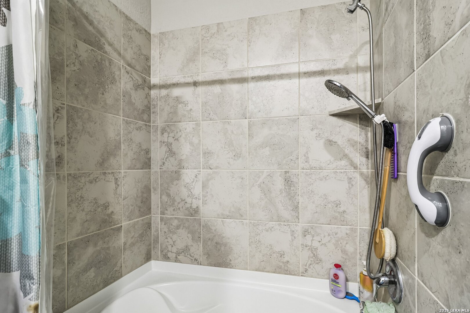 20045 Huckleberry Street Lytle, TX 78052 - Photo 28 of 39 a bathroom with a shower