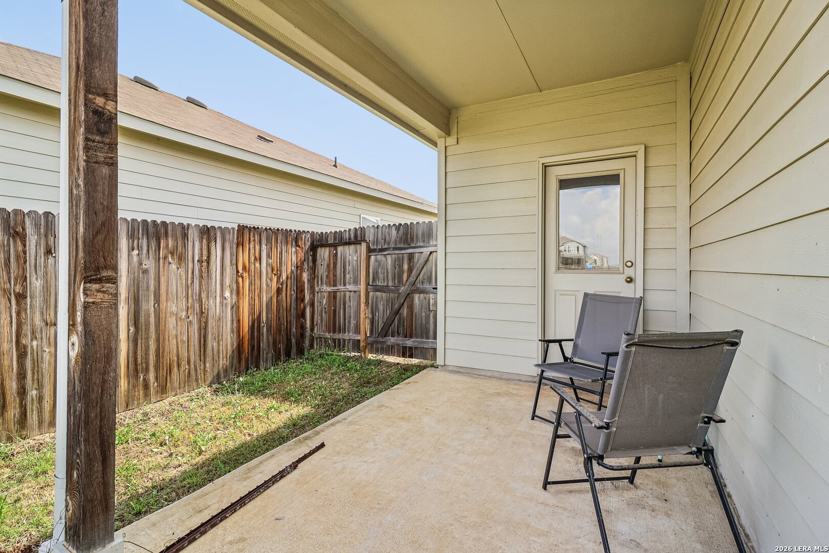 20045 Huckleberry Street Lytle, TX 78052 - Photo 30 of 39 a view of backyard with tub and chair