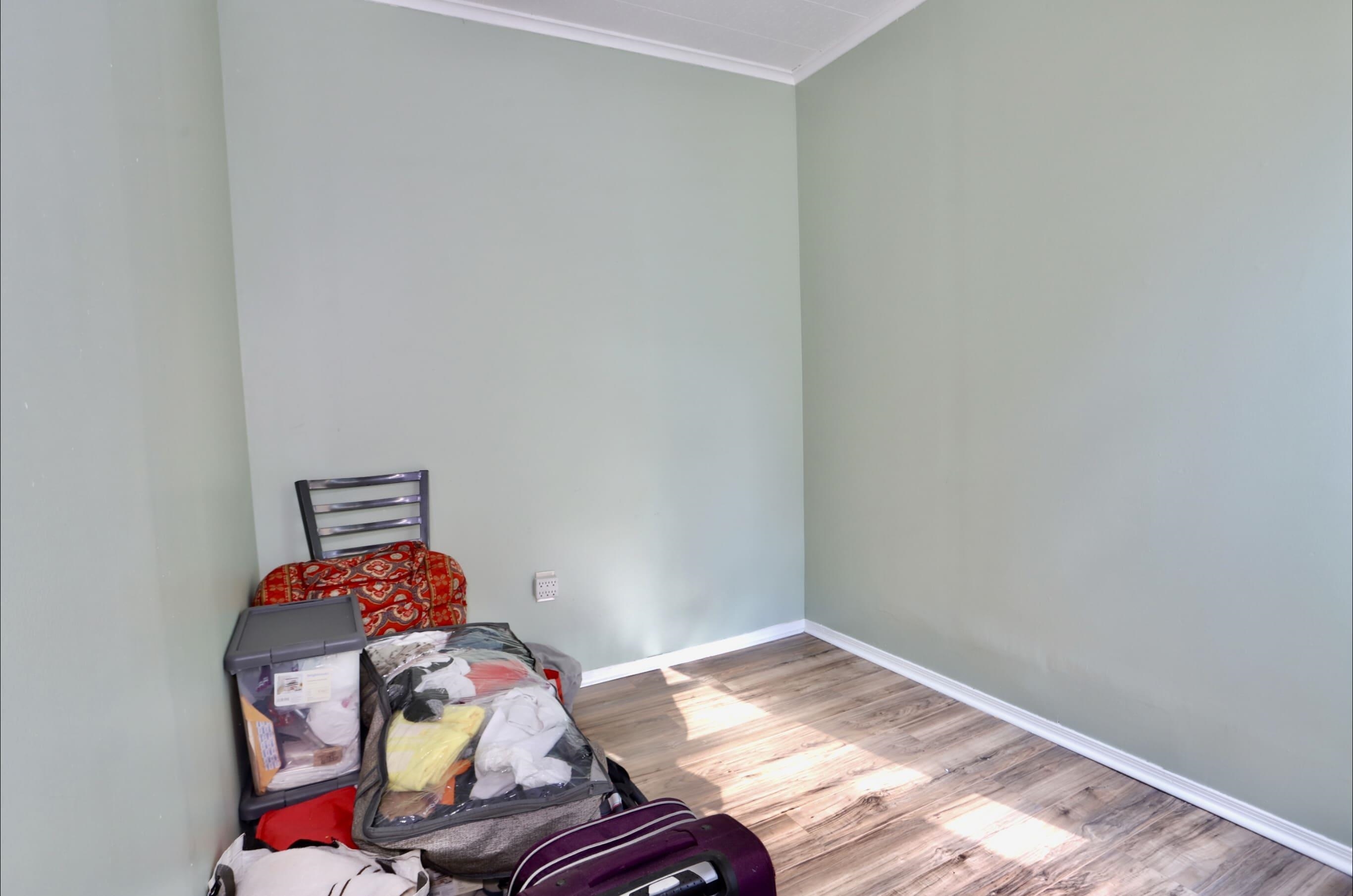 17 Grant Avenue, Unit 2 Harrison, NJ 07029 - Photo 15 of 17 a bedroom with a bed and toys