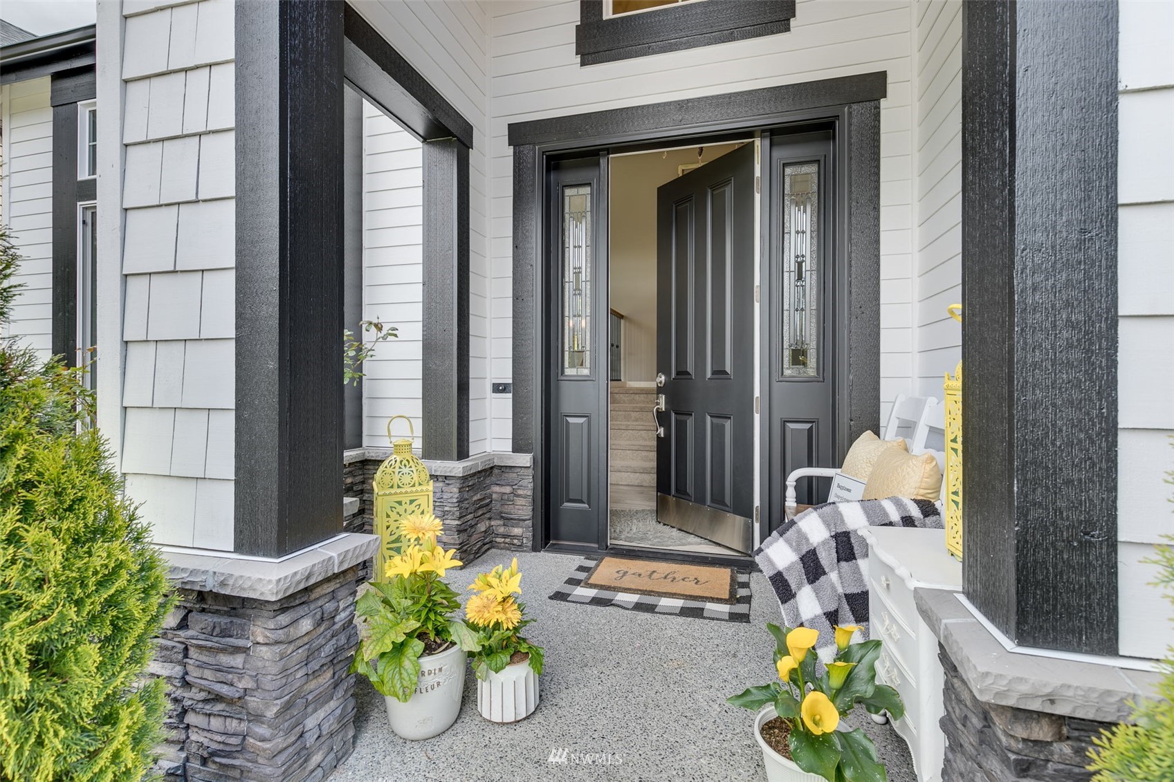4426 221st Street Southeast Bothell, WA 98021 - Photo 2 of 40 a front view of a house with outdoor seating