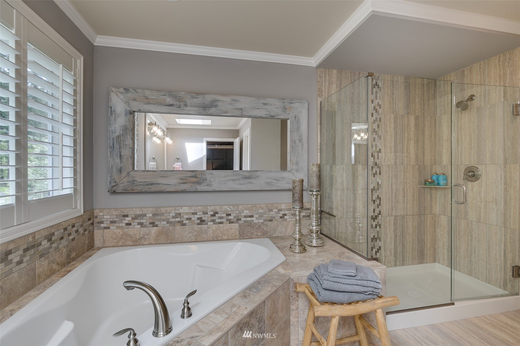 4426 221st Street Southeast Bothell, WA 98021 - Photo 26 of 40 a bathroom with a tub sink and mirror