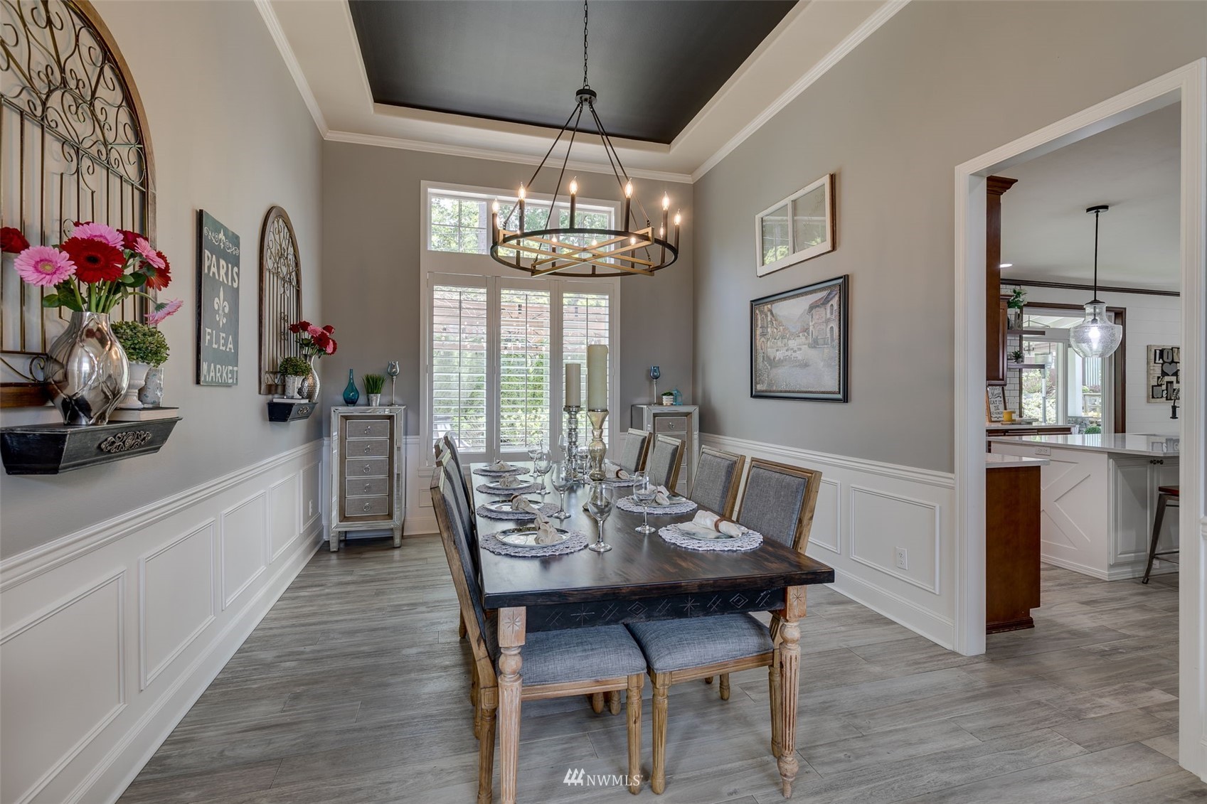 4426 221st Street Southeast Bothell, WA 98021 - Photo 9 of 40 a view of a dining room with furniture window and wooden floor