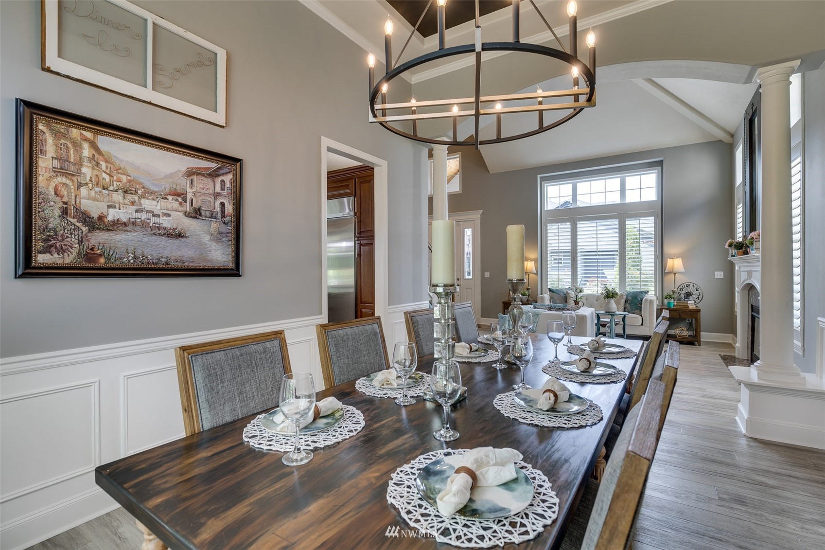4426 221st Street Southeast Bothell, WA 98021 - Photo 10 of 40 a view of a dining room with furniture wooden floor and chandelier