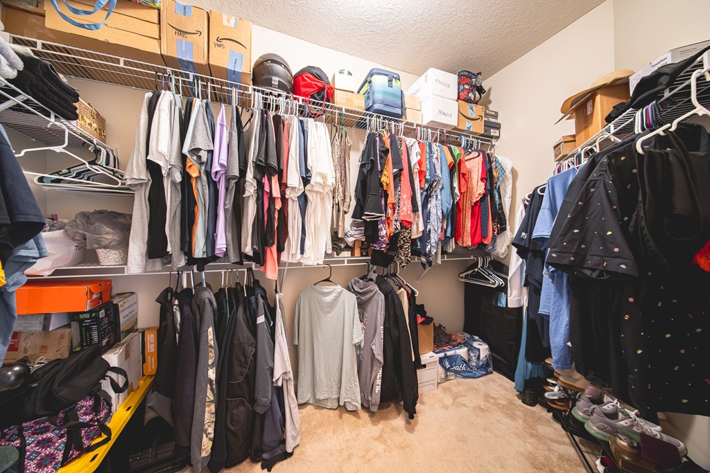 305 Owens Road Fort Mitchell, AL 36856 - Photo 19 of 44 a view of walk in closet with clothes