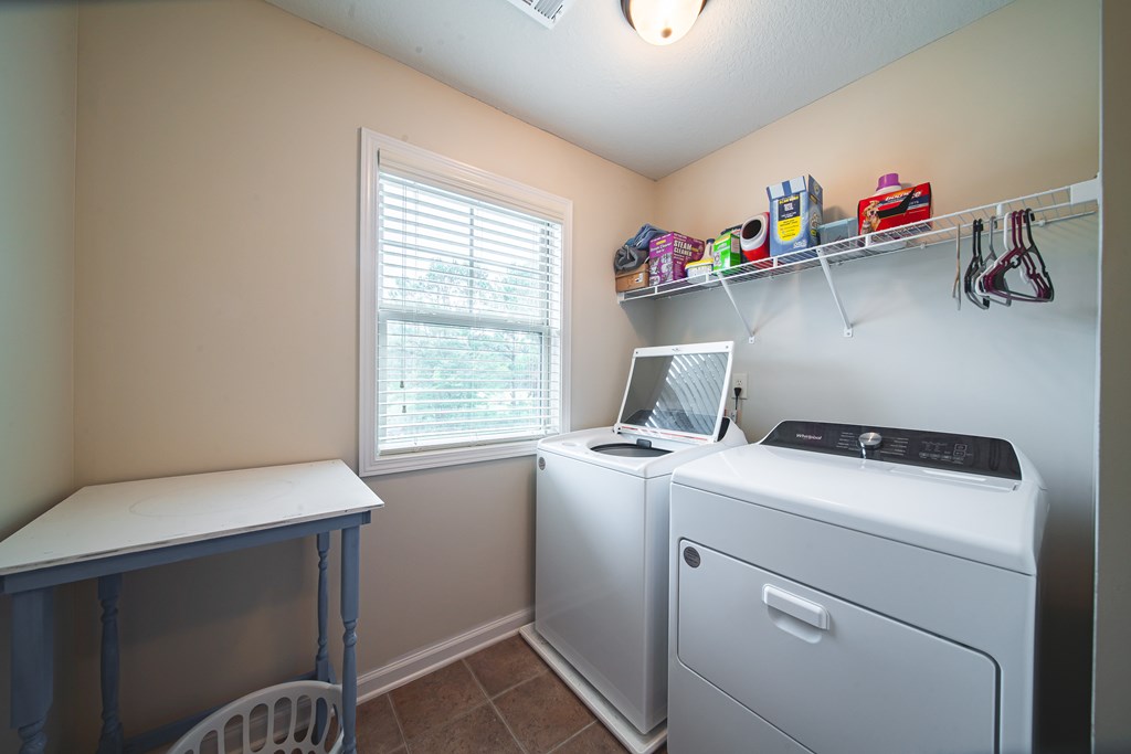 305 Owens Road Fort Mitchell, AL 36856 - Photo 35 of 44 a room with storage and utility