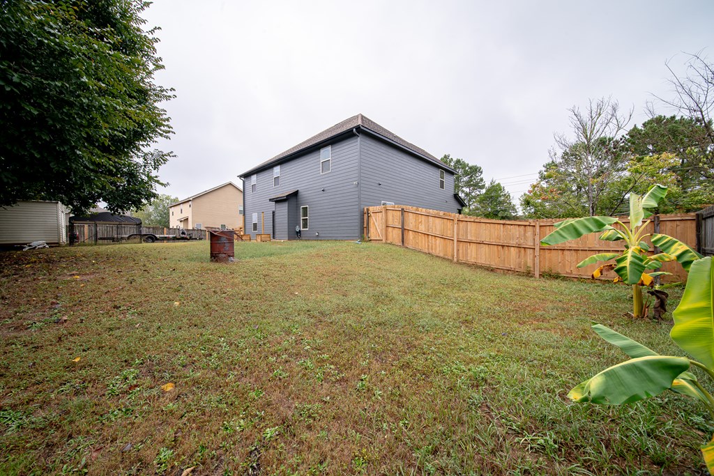 305 Owens Road Fort Mitchell, AL 36856 - Photo 42 of 44 a view of a backyard with large trees
