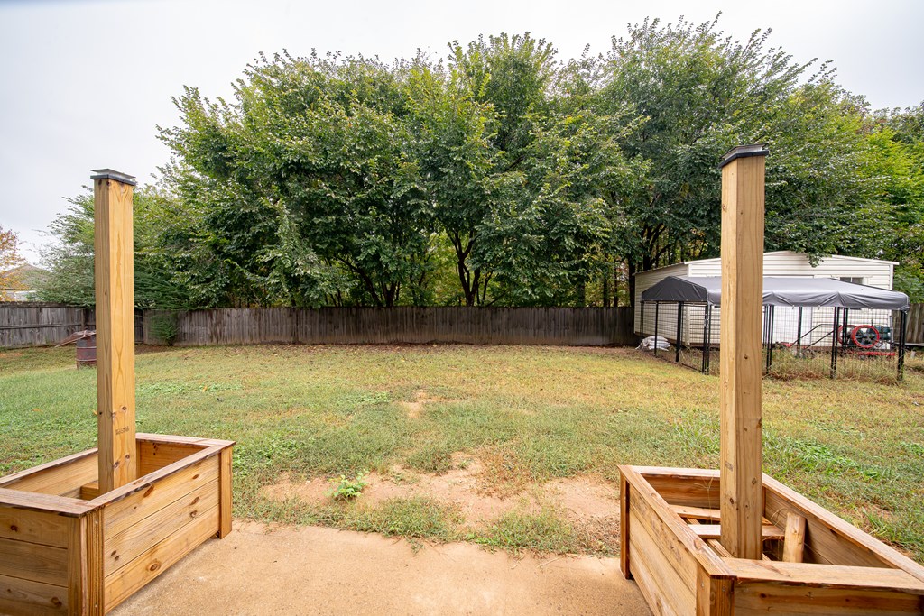 305 Owens Road Fort Mitchell, AL 36856 - Photo 44 of 44 a view of a swimming pool with a yard and furniture