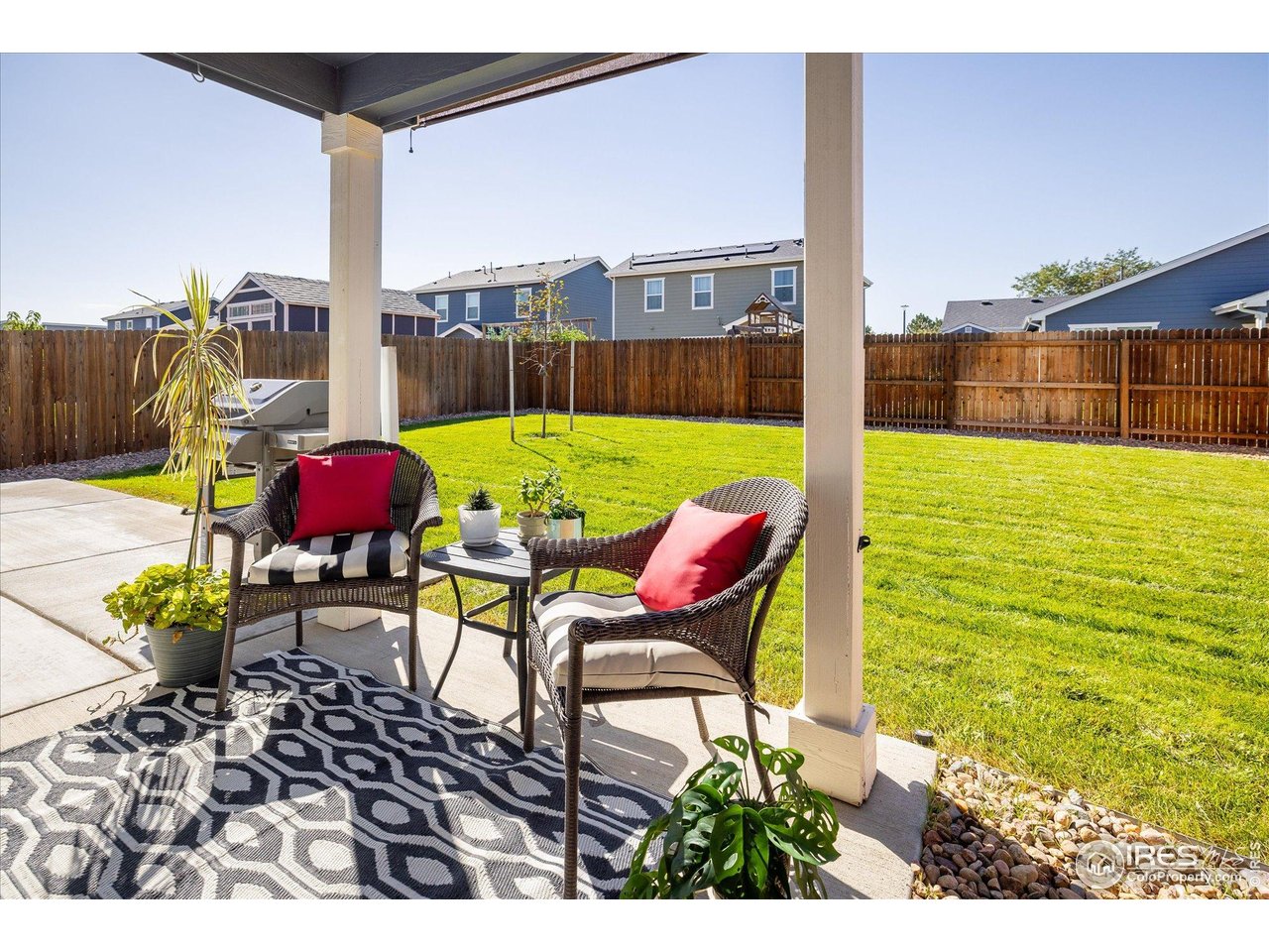 735 South Hoover Avenue Fort Lupton, CO 80621 - Photo 18 of 21 a view of an outdoor sitting area