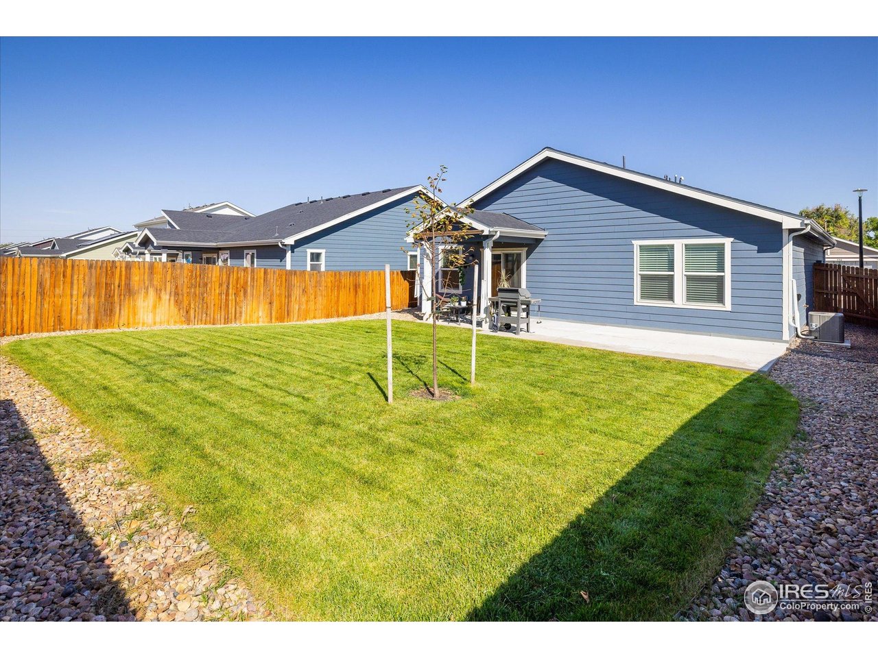 735 South Hoover Avenue Fort Lupton, CO 80621 - Photo 20 of 21 a house view with swimming pool in front of it