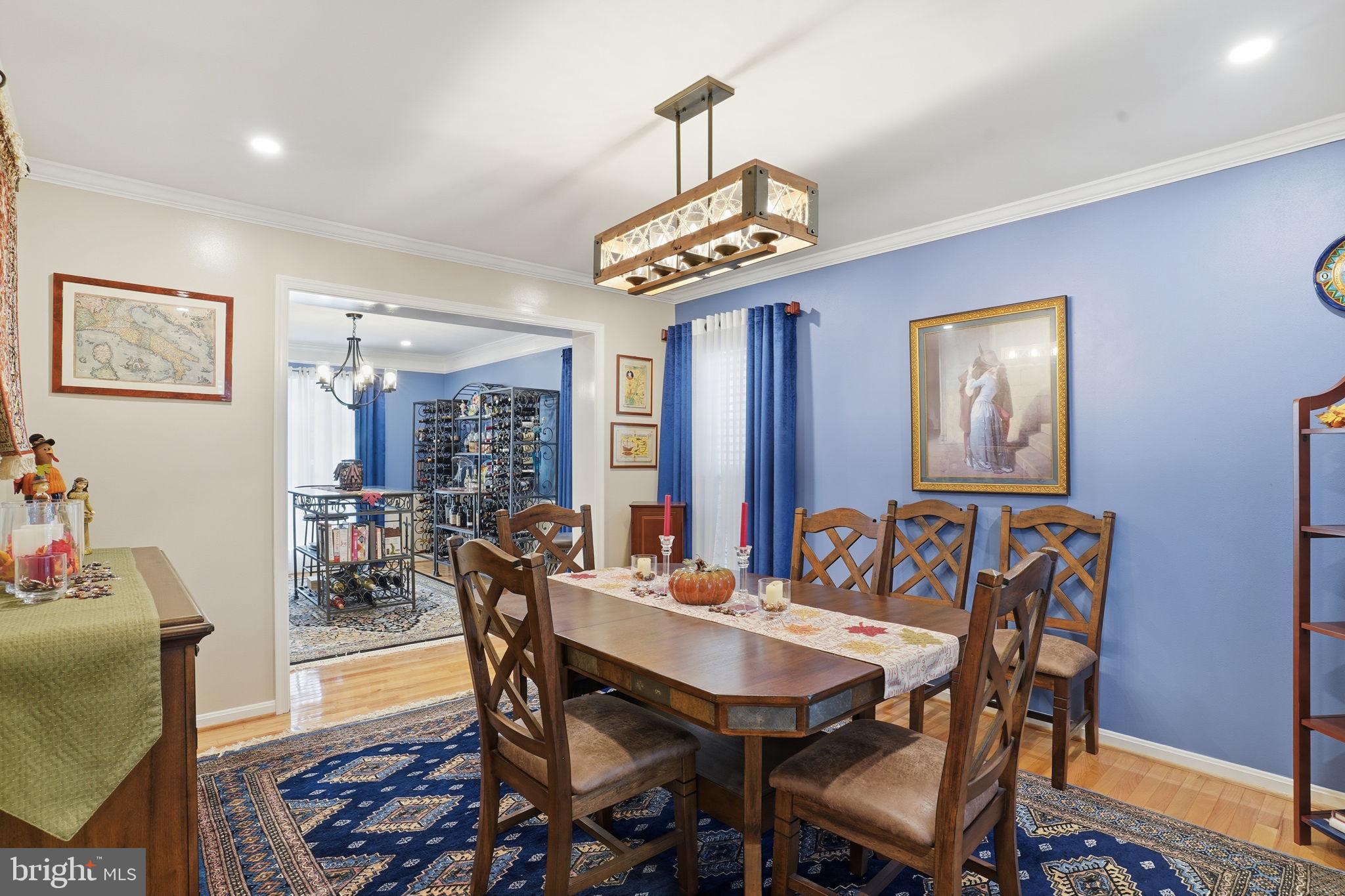 1311 Treasure Drive Odenton, MD 21113 - Photo 11 of 35 a view of a dining room with furniture window and wooden floor