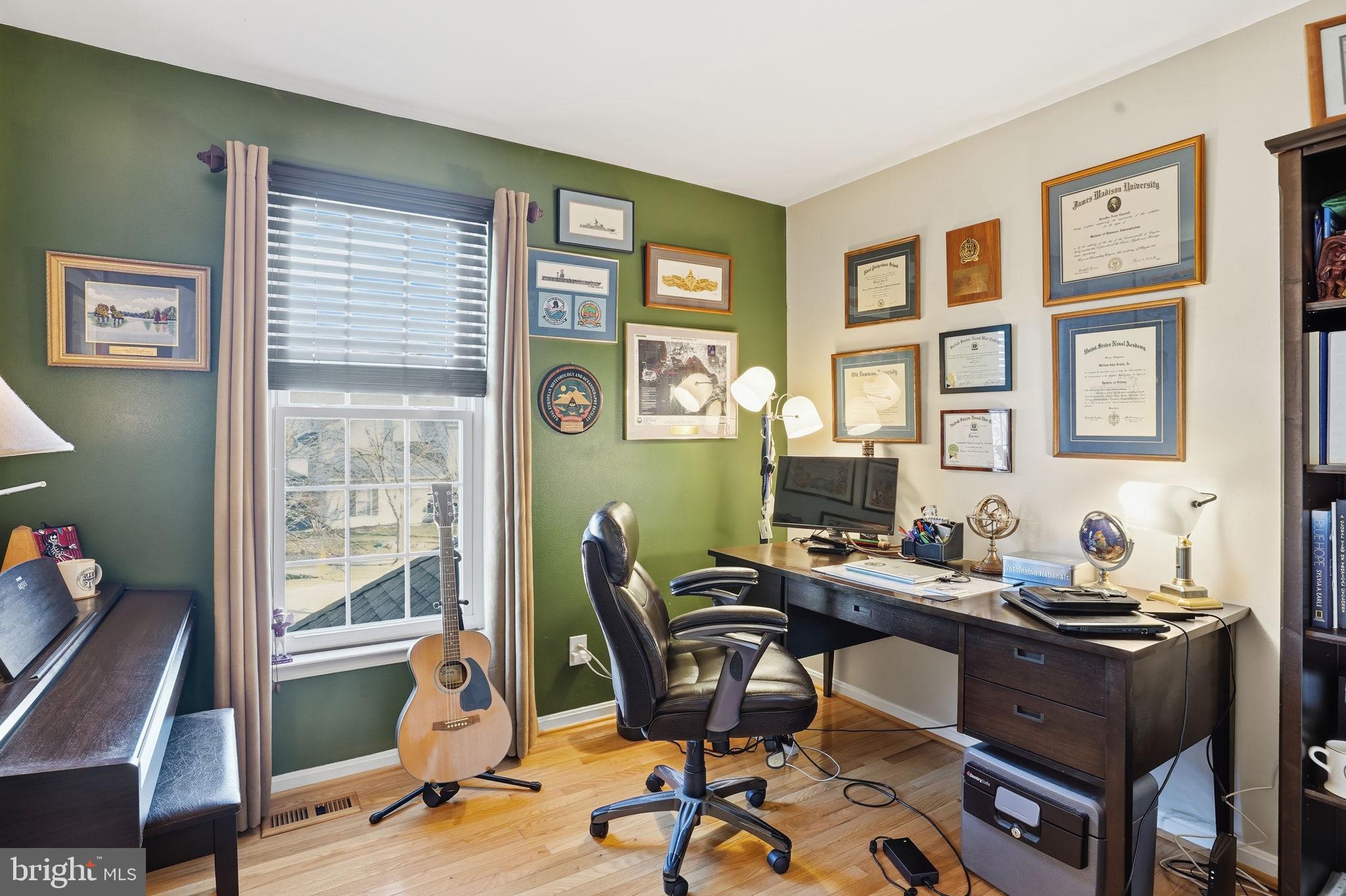 1311 Treasure Drive Odenton, MD 21113 - Photo 14 of 35 a view of a workspace with furniture and a window