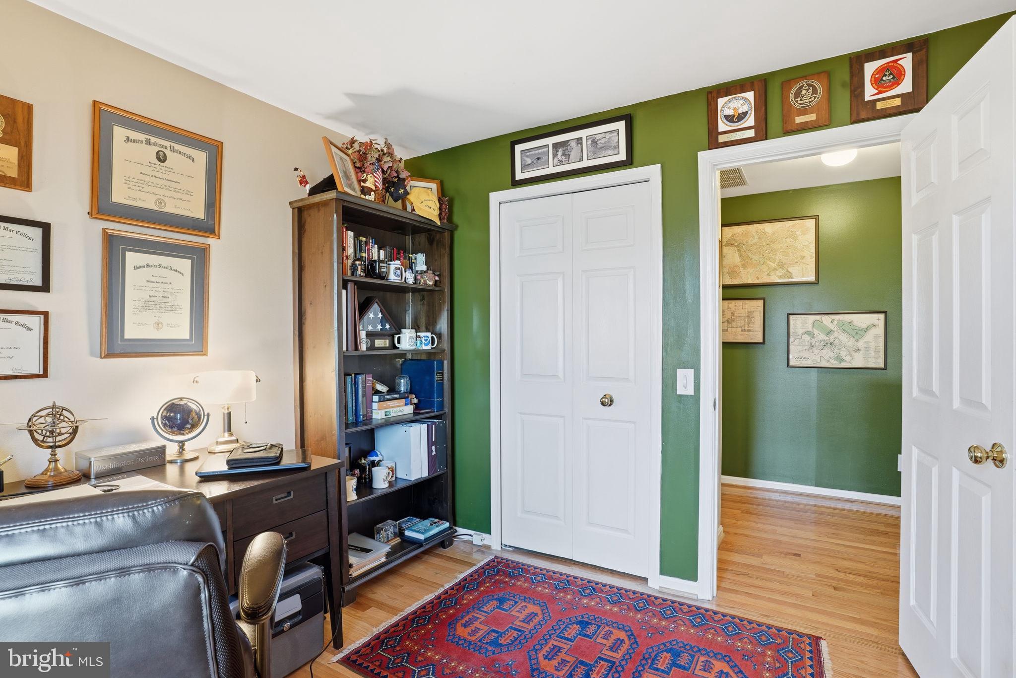 1311 Treasure Drive Odenton, MD 21113 - Photo 15 of 35 a room with furniture and book shelf