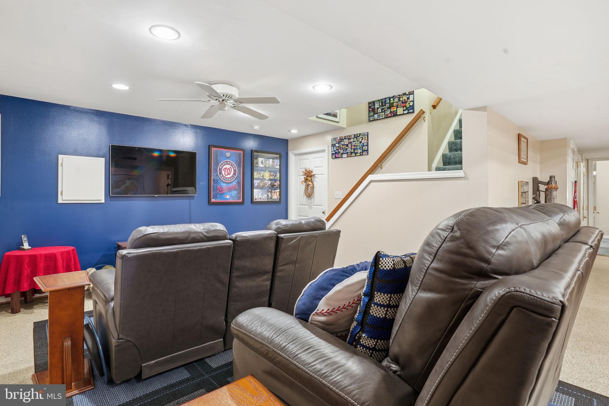 1311 Treasure Drive Odenton, MD 21113 - Photo 27 of 35 a living room with furniture ceiling fan and a window