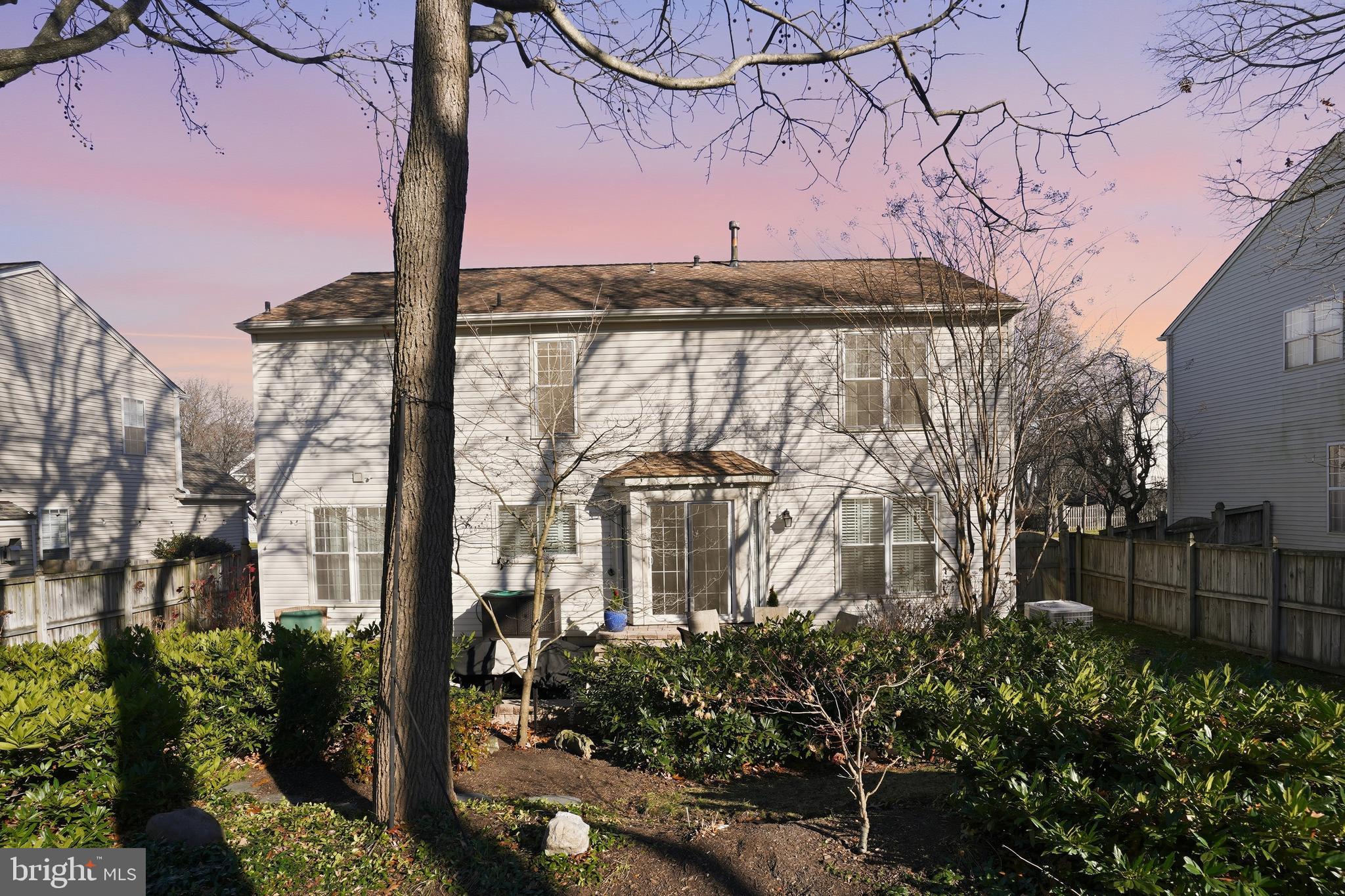 1311 Treasure Drive Odenton, MD 21113 - Photo 34 of 35 a front view of a house with a garden
