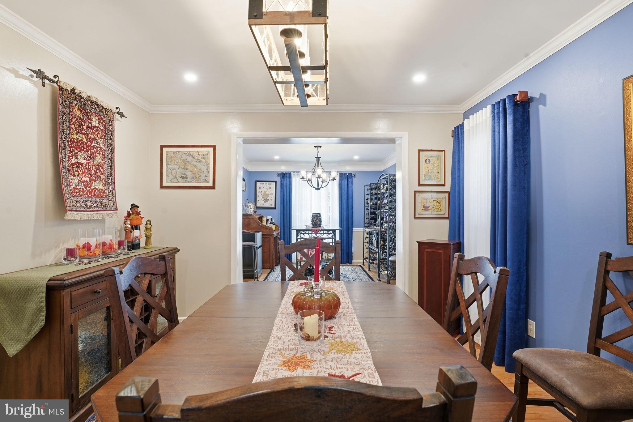 1311 Treasure Drive Odenton, MD 21113 - Photo 10 of 35 a room with furniture a chandelier and a window