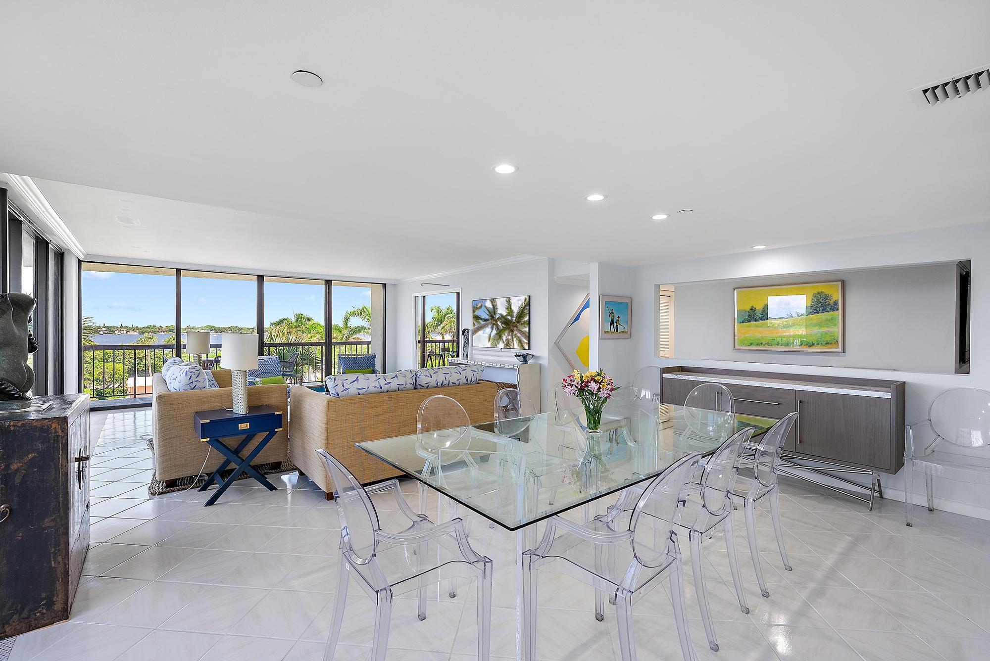 3390 South Ocean Boulevard, Unit 301 Palm Beach, FL 33480 - Photo 11 of 46 a living room with furniture and a table