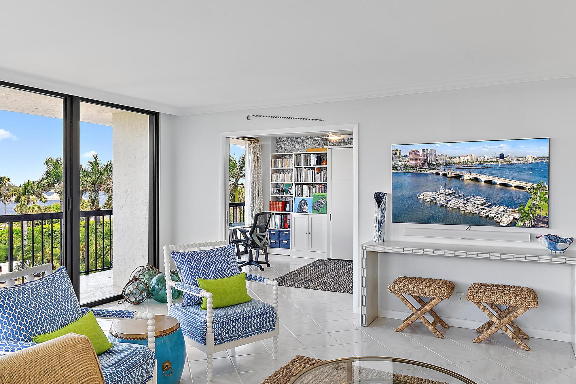 3390 South Ocean Boulevard, Unit 301 Palm Beach, FL 33480 - Photo 12 of 46 a living room with furniture and a large window