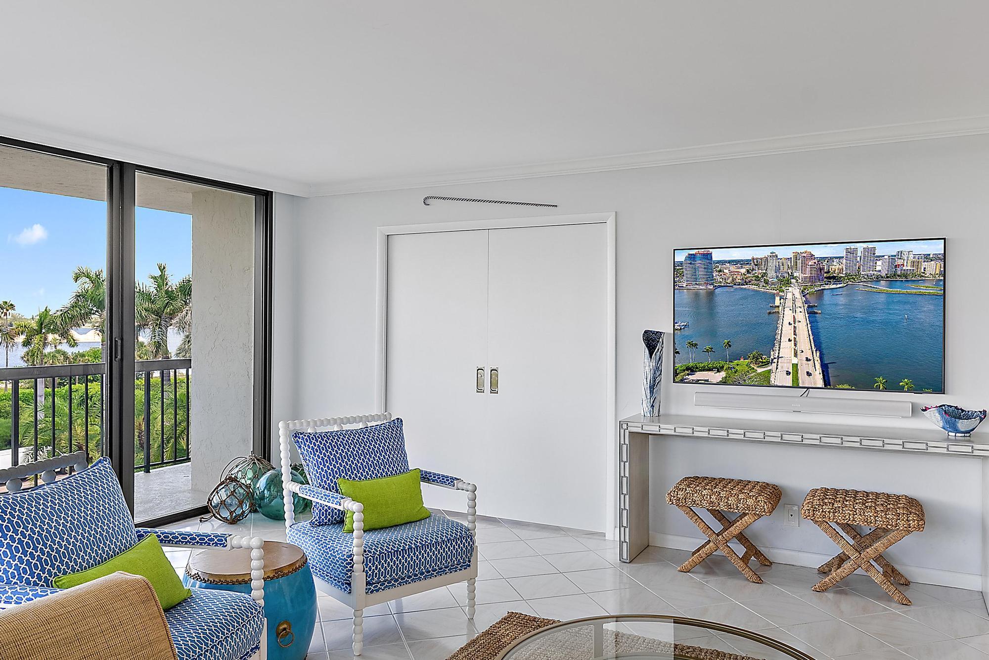 3390 South Ocean Boulevard, Unit 301 Palm Beach, FL 33480 - Photo 13 of 46 a living room with furniture and a wooden floor