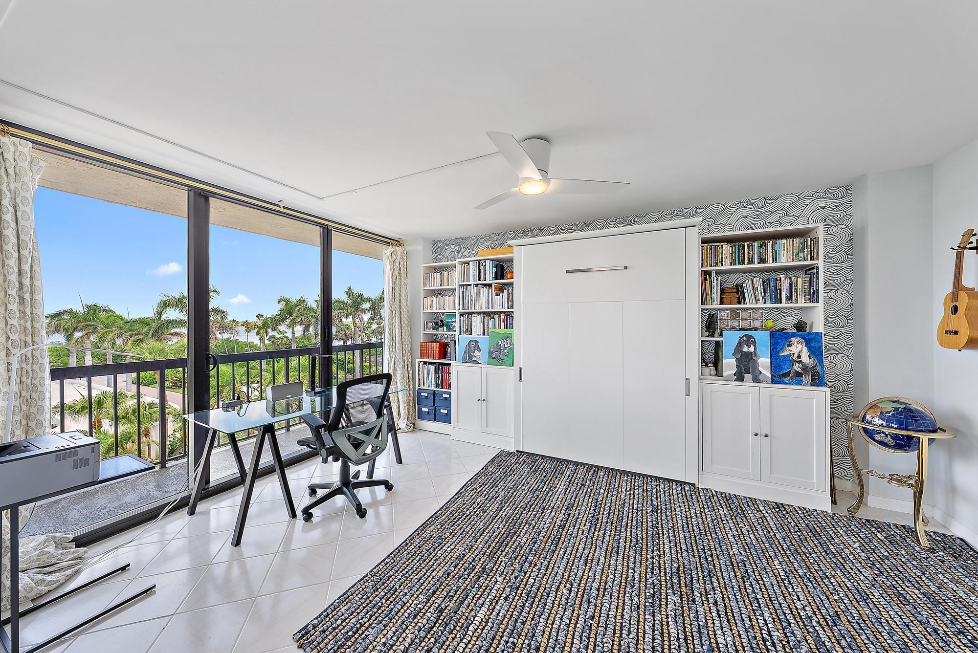 3390 South Ocean Boulevard, Unit 301 Palm Beach, FL 33480 - Photo 19 of 46 a view of a livingroom with furniture and wooden floor
