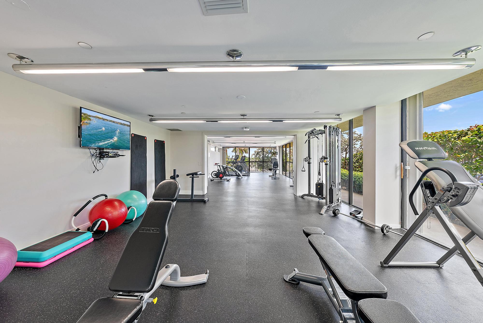 3390 South Ocean Boulevard, Unit 301 Palm Beach, FL 33480 - Photo 37 of 46 a view of a room with gym equipment