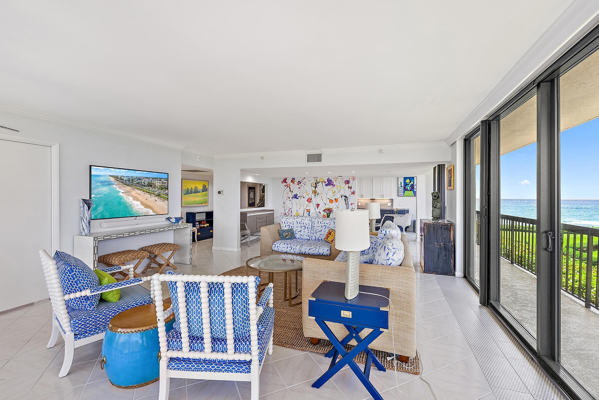 3390 South Ocean Boulevard, Unit 301 Palm Beach, FL 33480 - Photo 7 of 46 a very nice looking room with many windows and furniture