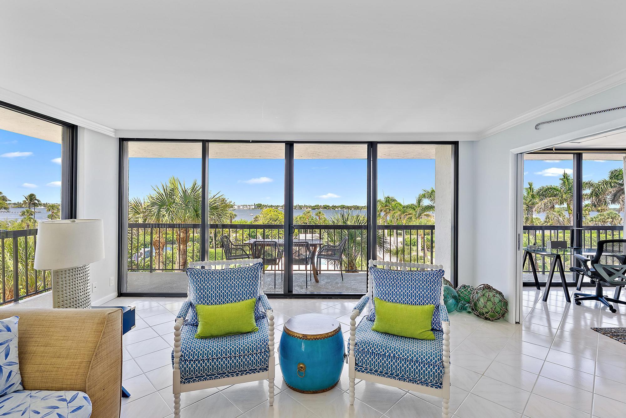 3390 South Ocean Boulevard, Unit 301 Palm Beach, FL 33480 - Photo 9 of 46 a living room with furniture and a large window
